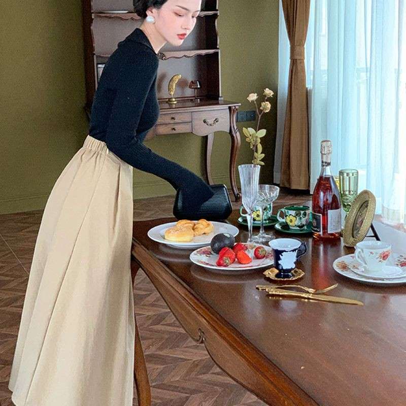 モード系ファッション 優雅なロングフレアスカート