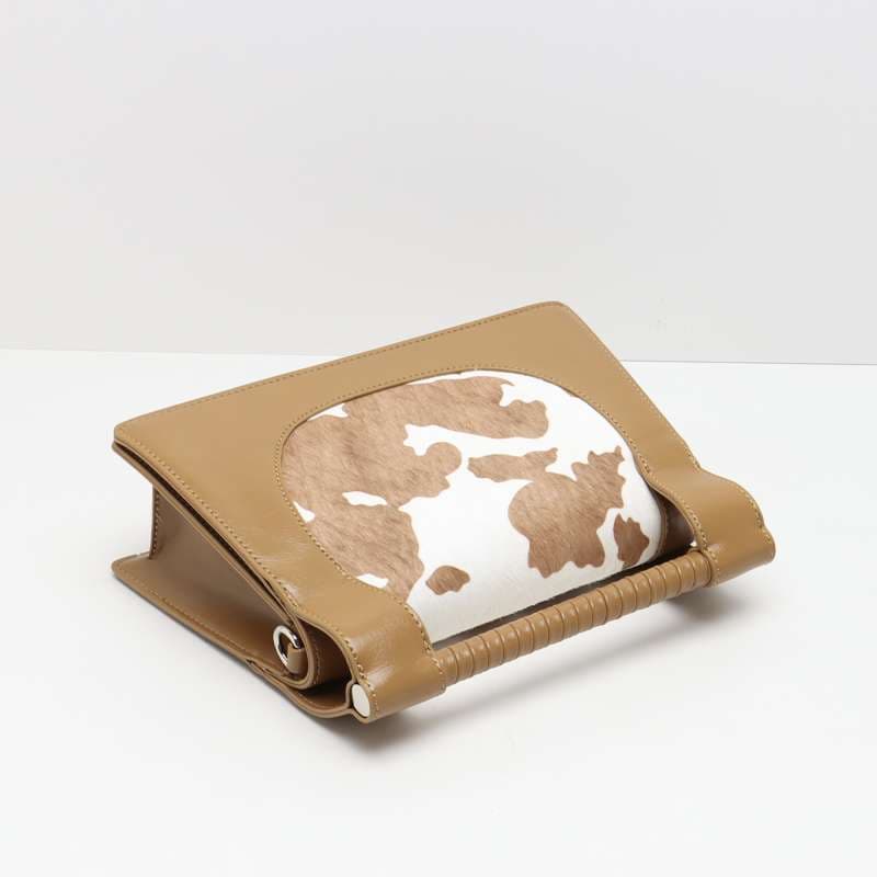 モード系ファッション カウハイドパターン レザーハンドバッグ